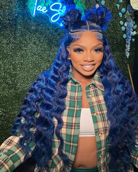 Electric blue crimped install with two space buns