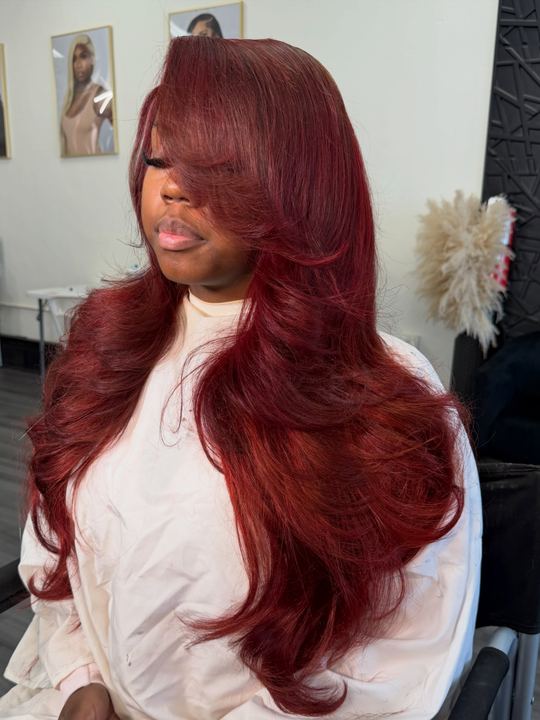 Burgundy install with long swoop bang