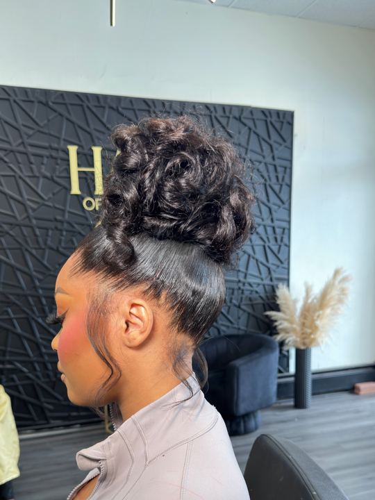 Back view of a sculpted curly updo